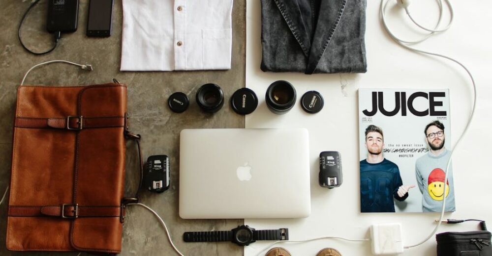 Essentials - Brown Leather Bag, Clothes, and Macbook