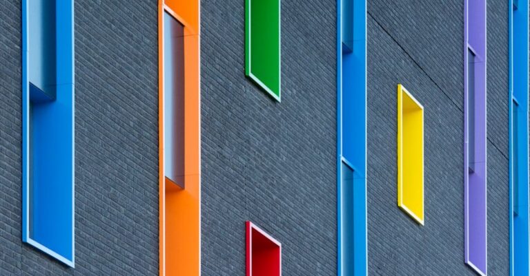 Multi-Tools - A close up of a building with many different colored windows