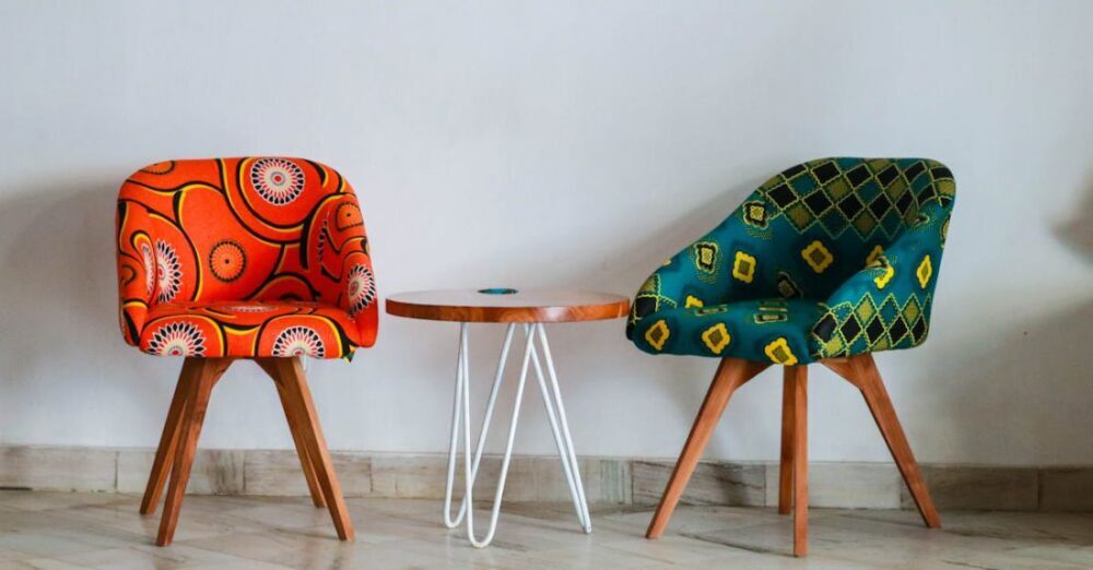 Chairs - Two Assorted-color Padded Chairs Near Side Table