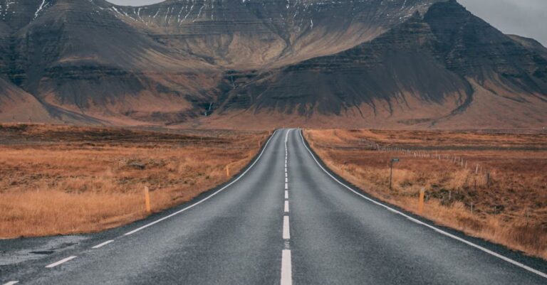 Adventure - Empty Highway Overlooking Mountain Under Dark Skies